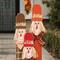 Glitzhome® 36.25" Wooden Scarecrow Family Porch Décor with Lighted Wreath & Timer
